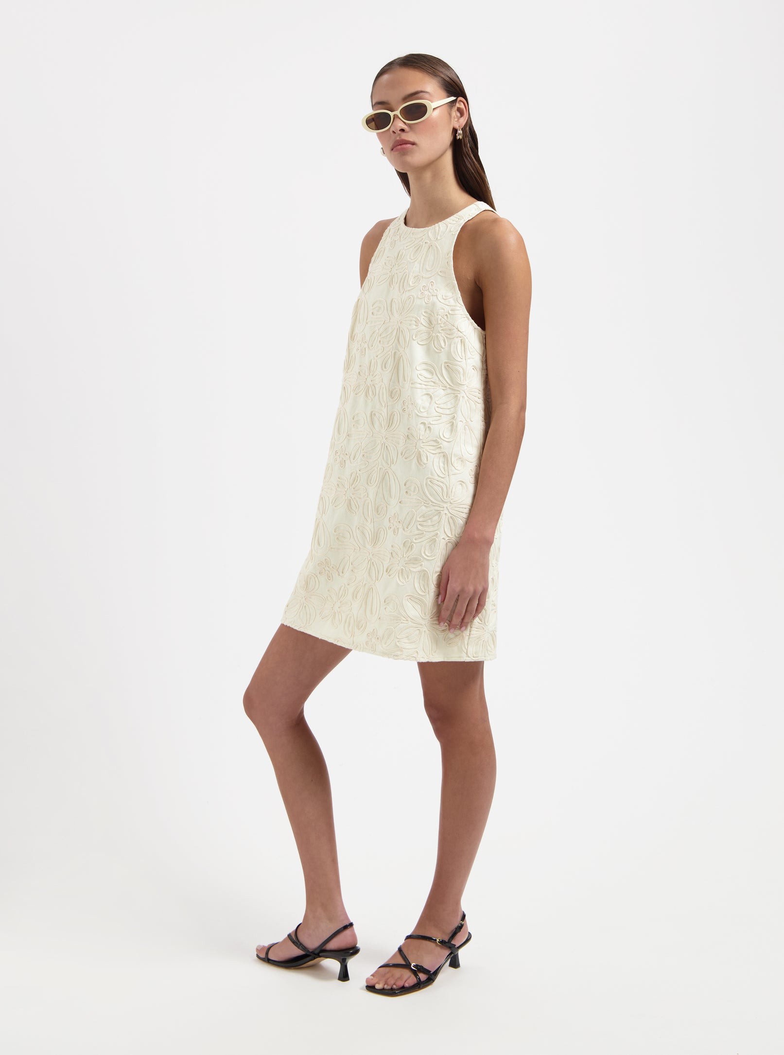 Cream textured sleeveless shift dress with round neckline by Nous Sommes Labels