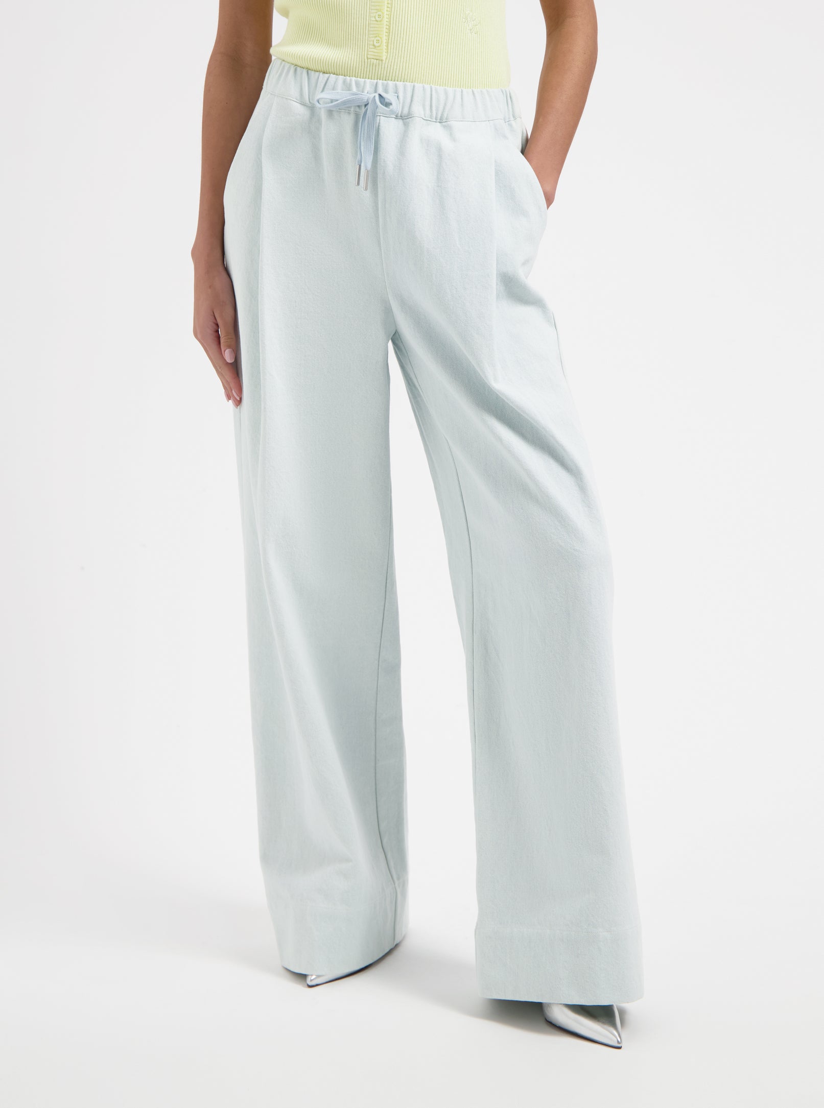 Light blue wide-leg pants with elastic waistband by Nous Sommes Labels