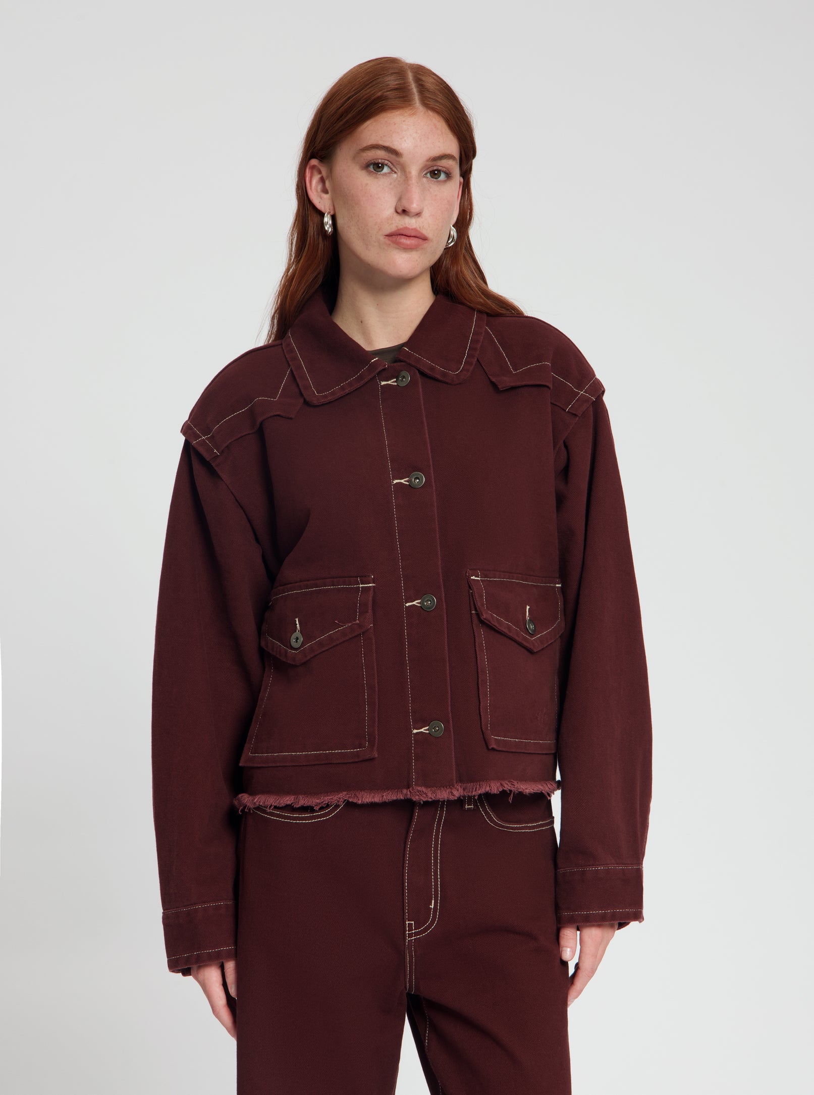 Model wearing Ancy Denim Jacket in burgundy - NOUS SOMMES LABELS