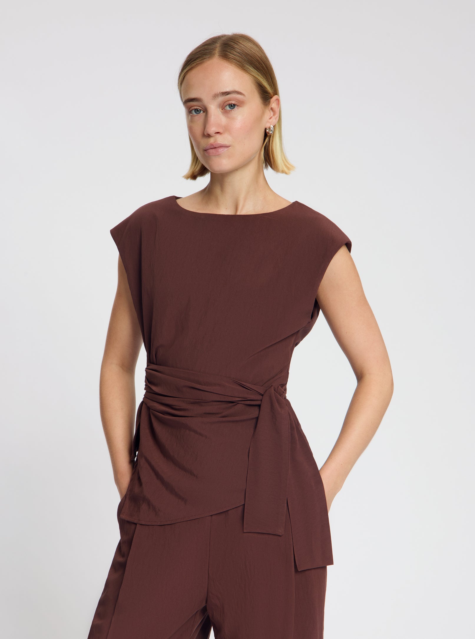 Model wearing the Maddie Tie Top in Brown - NOUS SOMMES LABELS