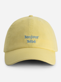 Yellow cap with 'Bonjour Bèbè' embroidery by Nous Sommes Labels 