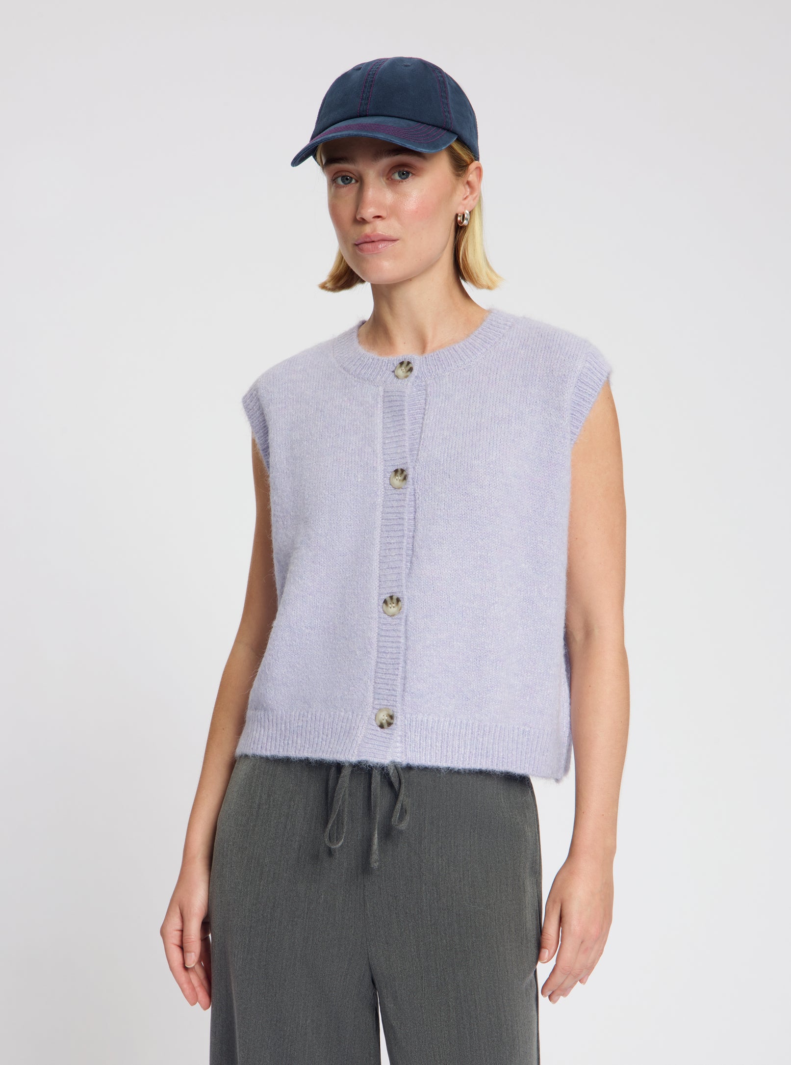 Model wearing Baseball Cap in navy - NOUS SOMMES LABELS 