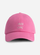 Pink cap with 'Très Chic' rhinestone by Nous Sommes Labels 