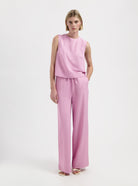 Pink sleeveless top with round neckline by Nous Sommes Labels 