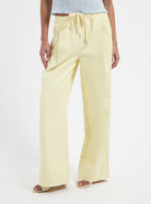 Yellow wide leg pants with elastic waistband by Nous Sommes Labels 