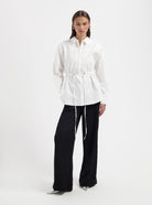 White oversized Blouse with waist drawstring by Nous Sommes Labels 