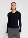 Model wearing the Winnie Polo Knit in Black - NOUS SOMMES LABELS