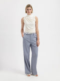 White sleeveless draped top with high neckline by Nous Sommes Labels 