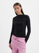 Black draped longsleeve top with high neckline by Nous Sommes Labels 