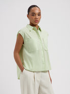 Light green sleeveless oversized blouse by Nous Sommes Labels 