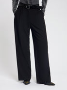 Model wearing the Gabbie Trousers in Black - NOUS SOMMES LABELS