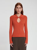 Model wearing Maya Knit Top in orange - NOUS SOMMES LABELS 