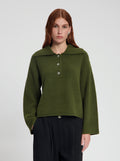 Model wearing Lana pullover in dark green - NOUS SOMMES LABELS 