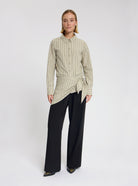 Model wearing the Grace Blouse in Beige Stripe - NOUS SOMMES LABELS