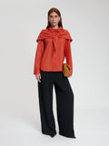 Model wearing Grace blouse in orange - NOUS SOMMES LABELS 