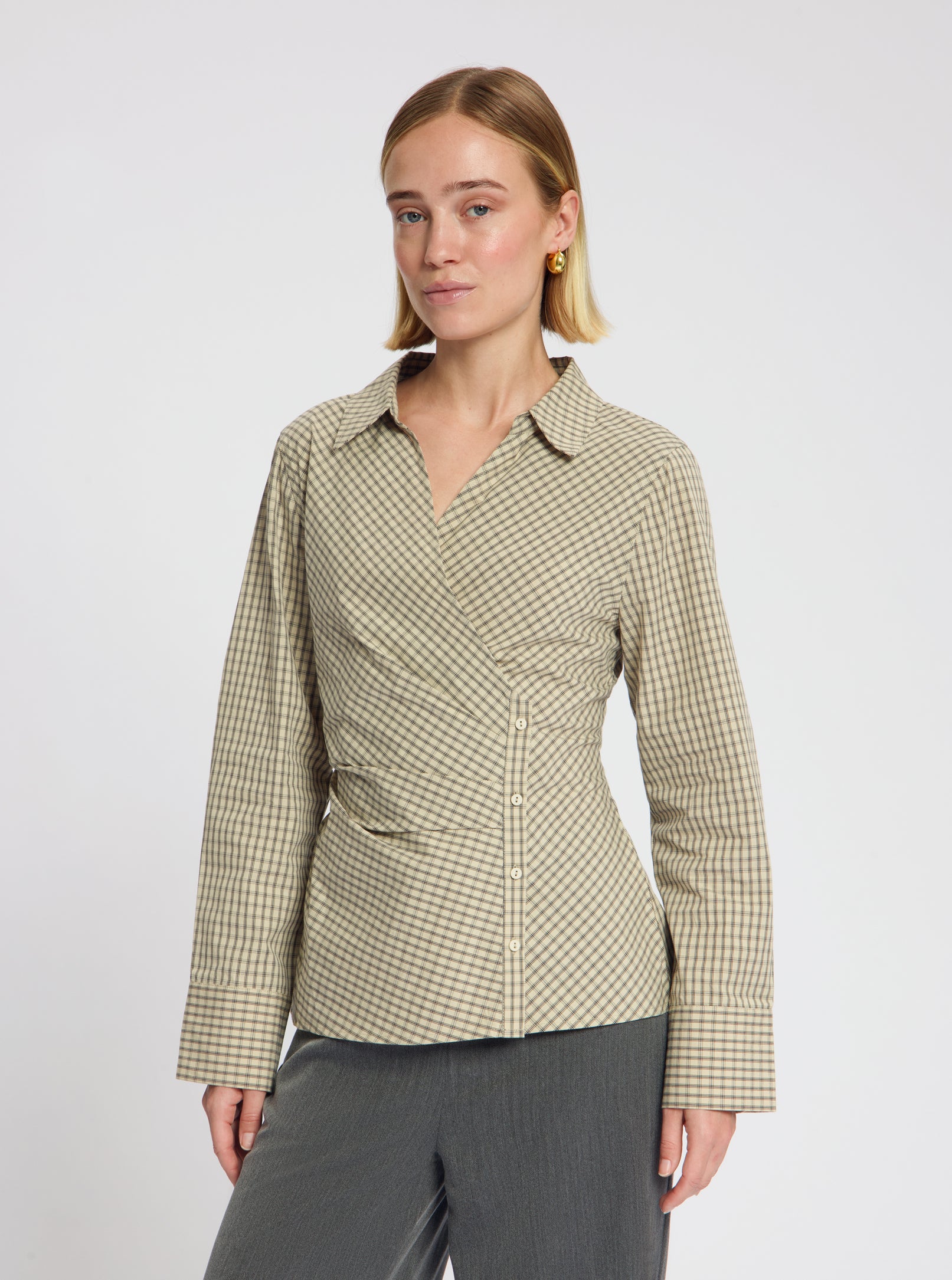 Model wearing the Mirrie Blouse in Beige - NOUS SOMMES LABELS