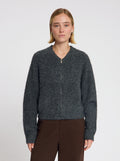 Model wearing the Lara Cardigan in Grey - NOUS SOMMES LABELS