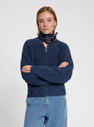 Model wearing the Lara Cardigan in Navy - NOUS SOMMES LABELS