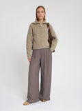 Model wearing the Clairie High Zip Cardigan in Sand - NOUS SOMMES LABELS
