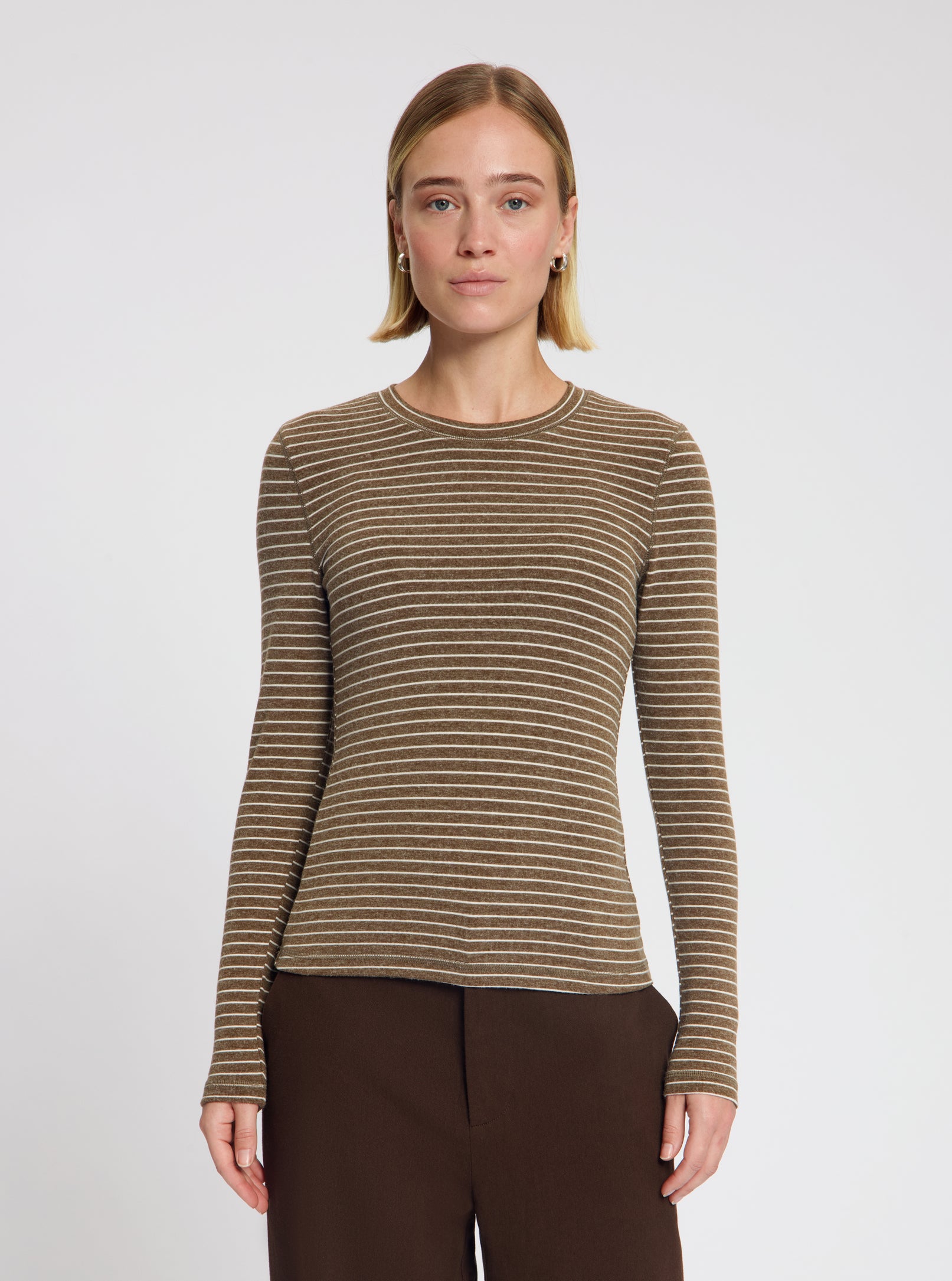Model wearing the Timmie Stripe Top in Beige Stripe - NOUS SOMMES LABELS