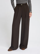 Model wearing the Wren Trousers in brown - NOUS SOMMES LABELS