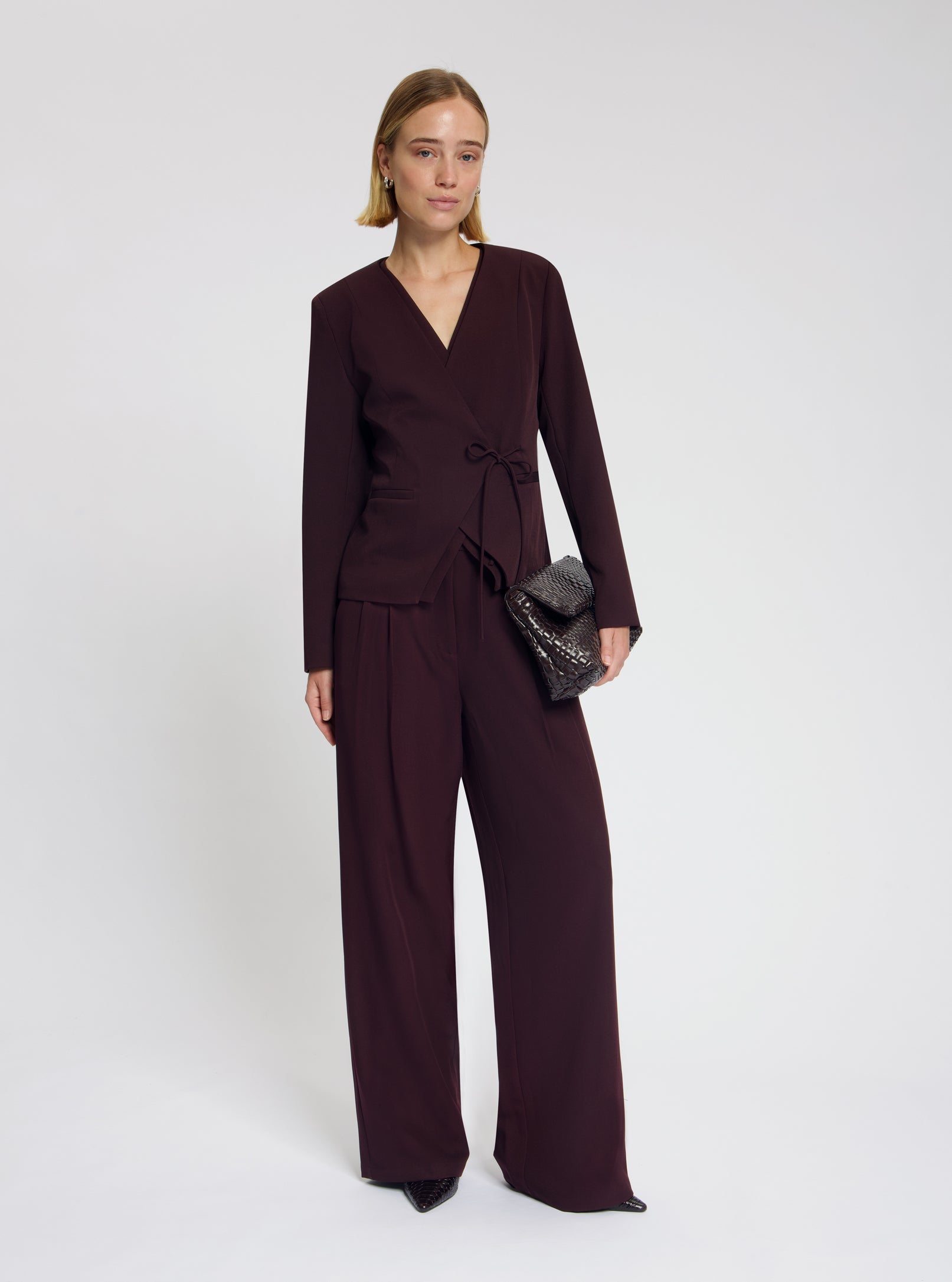 Model wearing the Zoya Tie Blazer in Burgundy - NOUS SOMMES LABELS